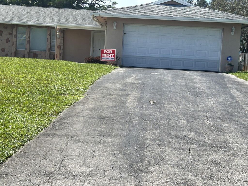 Photo of 3940 Buttercup Circle S, Palm Beach Gardens, FL 33410 (MLS # R11028788)