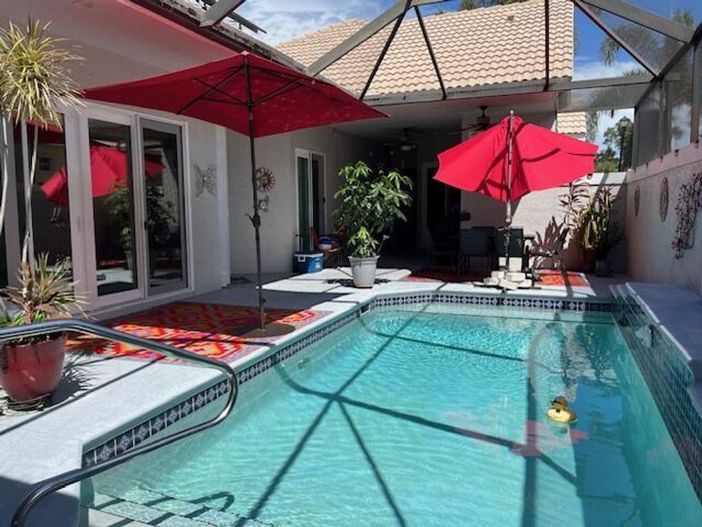 Photo of 652 SW Munjack Cove, Port Saint Lucie, FL 34986 (MLS # R11082931)