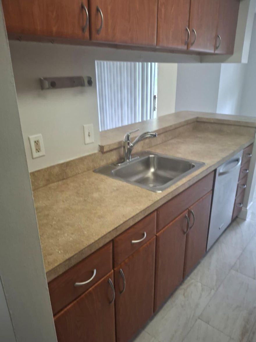 Beautiful 2 bed/2bath, 1 floor unit  w/ a water view.  Two Assign  Parking Spots. Zoned for Stoneman Douglas High School. This unit features full size washer/dryer, tile floors throughout, updated bathrooms & kitchen, lots of closet space and private balcony. Enjoy all Citation Way has to offer including pool, spa, clubhouse
