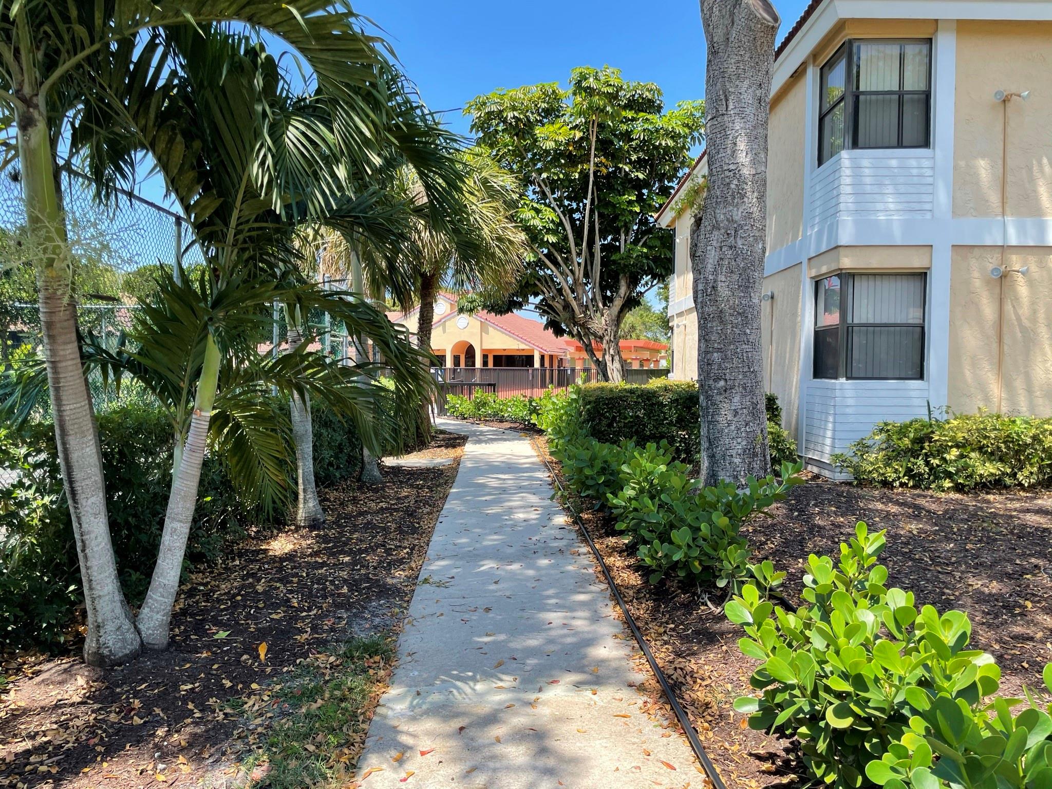 Beautifully just renovated spacious 2/2 unit. Unit next to tennis courts and a short walk away from the clubhouse! gorgeous vinyl flooring throughout unit. FULLY UPGRADED KITCHEN! Stainless steel appliances, quartz counter tops, white cabinets. Serene water view from the patio with access from the living room and the master bedroom. Assigned parking space.