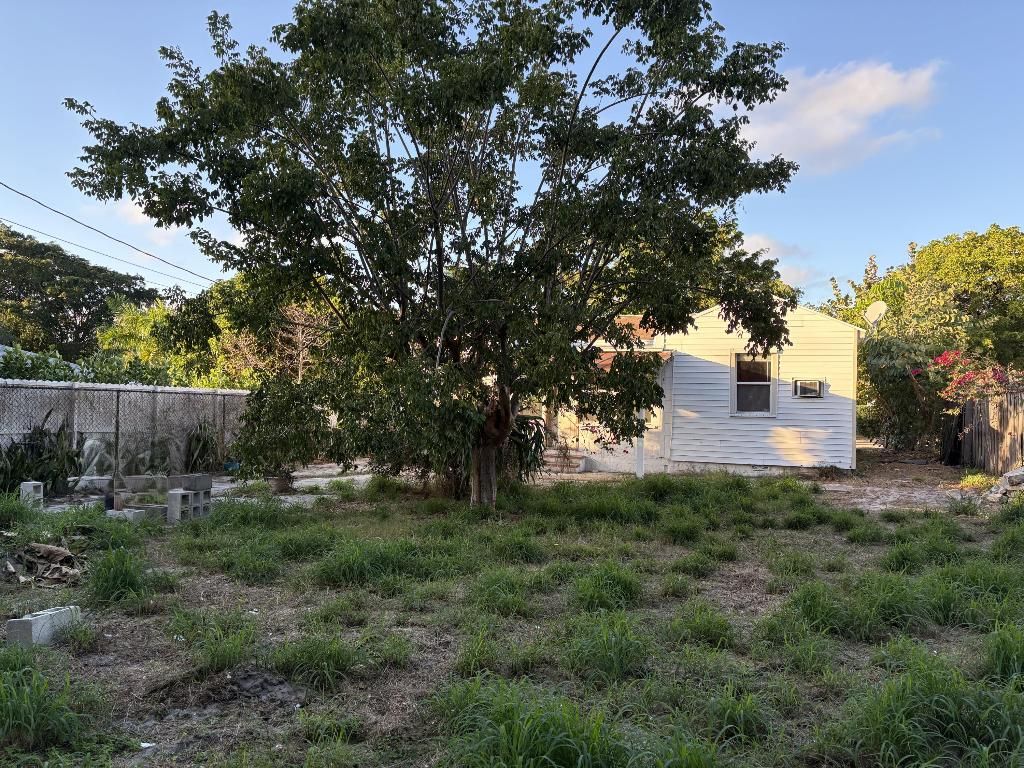 Photo of 926 NW Upland Road, West Palm Beach, FL 33401 (MLS # R11157642)