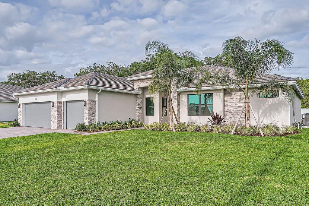 Photo of 1510 SW Lago Circle, Palm City, FL 34990 (MLS # R10975398)