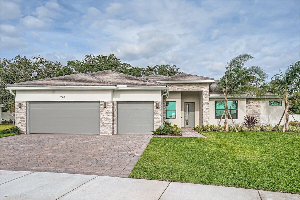 Photo of 1510 SW Lago Circle, Palm City, FL 34990 (MLS # R10975398)