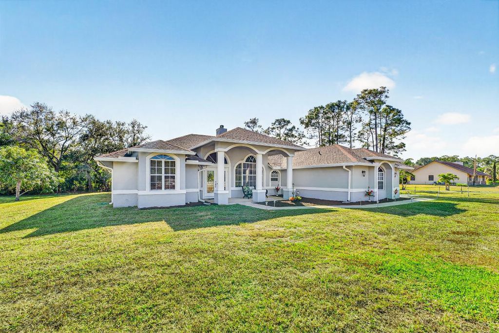 Photo of 13358 Persimmon Boulevard, The Acreage, FL 33411 (MLS # R11154222)