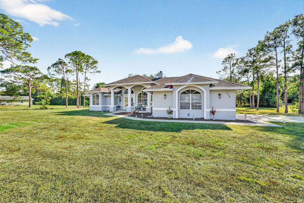 Photo of 13358 Persimmon Boulevard, The Acreage, FL 33411 (MLS # R11154222)