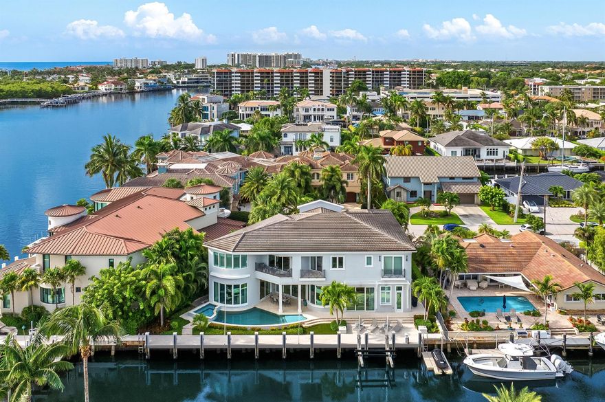 A rare offering from the esteemed Mary Widmer Luxury Collection, this modern West Indies estate epitomizes the height of waterfront living in Boca Raton. Set on a lushly landscaped 7,853-square-foot lot, this stunning residence, built in 2018, offers 120 feet of deep-dredged waterfront on an interior canal, just one property removed from the Intracoastal Waterway with direct ocean access. With over 5,600 square feet of air-conditioned living space and more than 6,700 total square feet, this meticulously crafted home blends sleek architectural lines with timeless coastal elegance, creating a sanctuary that is both a visual masterpiece and a haven of luxury.