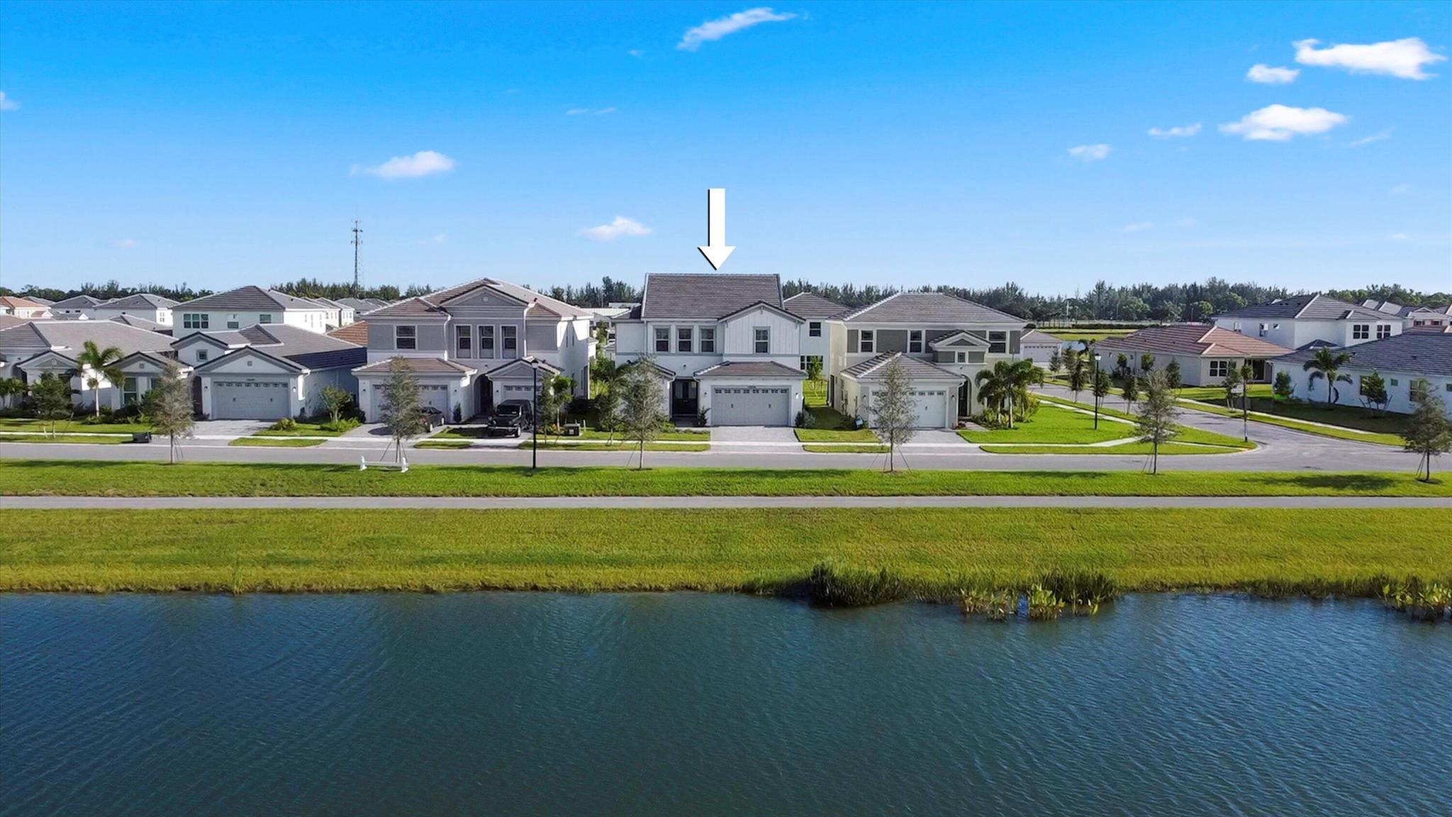 NEVER LIVED IN!! STILL UNDER BUILDER WARRANTY! Welcome to this stunning Birchwood Grand model in the highly sought-after Pines community of Westlake, offering 5 bedrooms with closets, 5 bathrooms, media room, loft, and a spacious 2-car garage with over 4,000 square feet of living space. This never-before-lived-in residence, still under builder warranty, sits on a beautifully maintained lot with a large paved driveway, manicured landscaping, and a picturesque lake view at the front of the home.