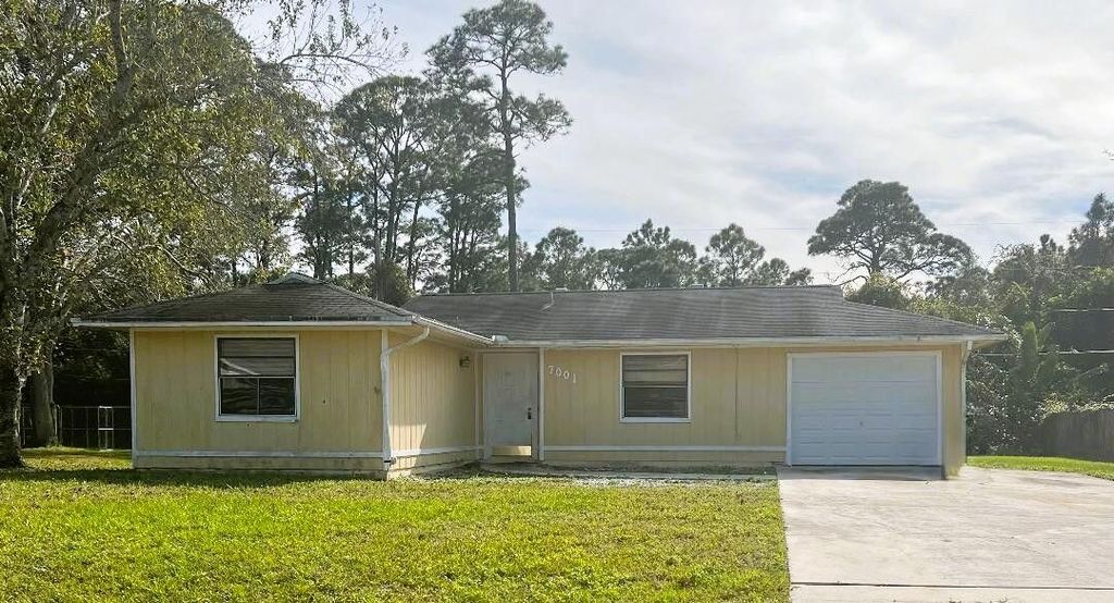 Photo of 7001 Pacific Avenue, Fort Pierce, FL 34951 (MLS # R11066028)