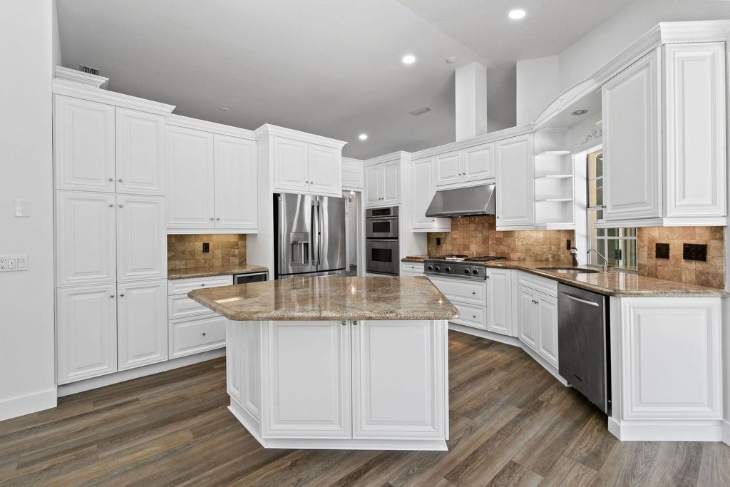 Photo of 230 Eagleton Estates Boulevard, Palm Beach Gardens, FL 33418 (MLS # R10919553)