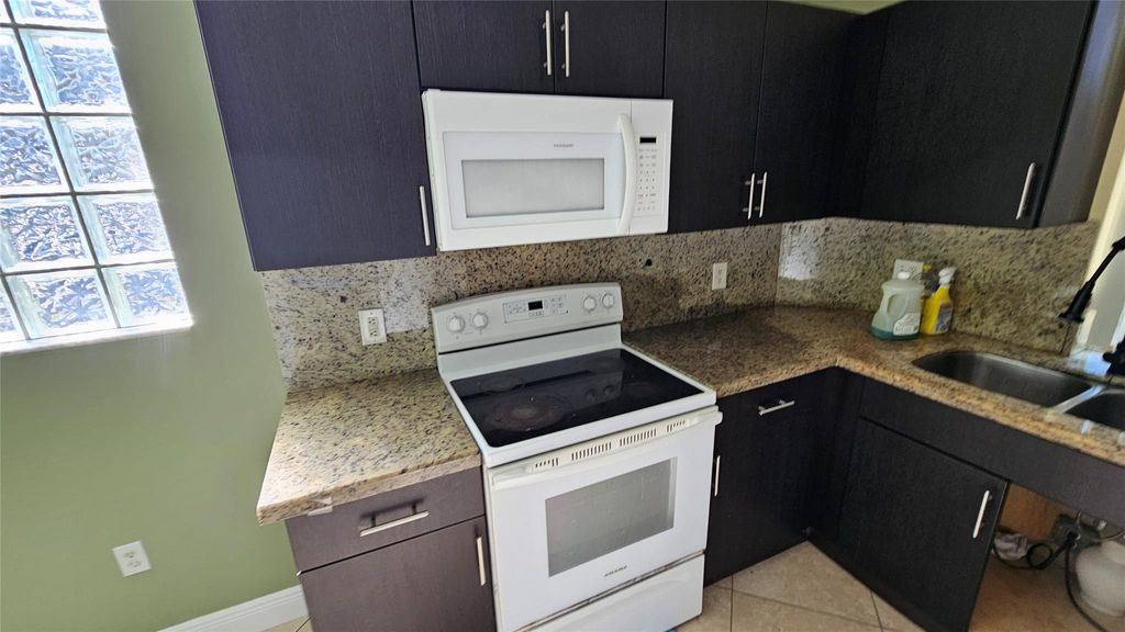 Photo of 6960 SW 39th Street #E101, Davie, FL 33314 (MLS # F10551769)