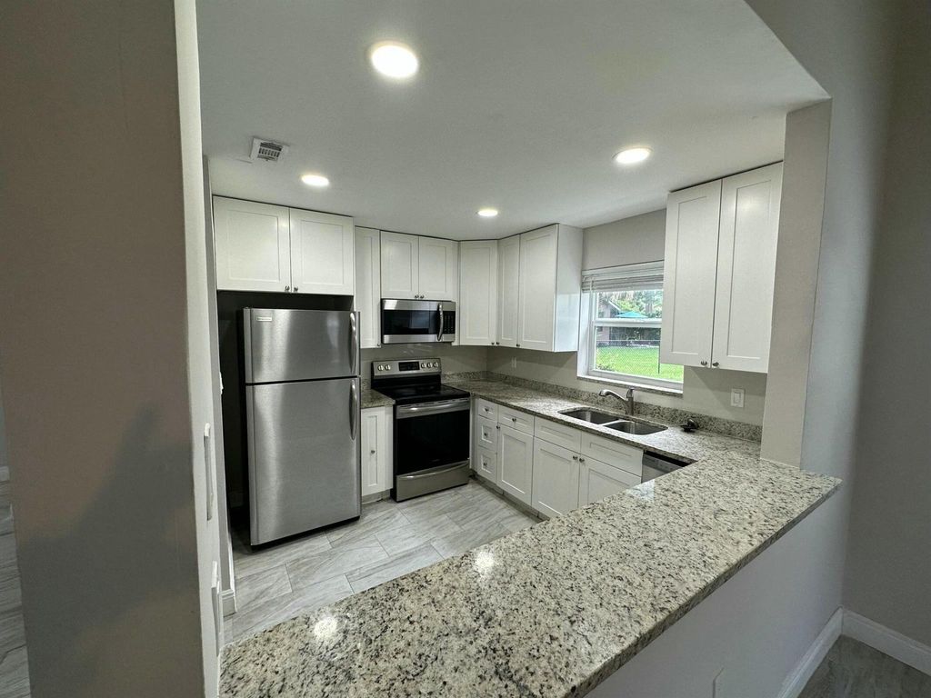 Photo of 10659 La Placida Drive, Coral Springs, FL 33065 (MLS # R11052743)