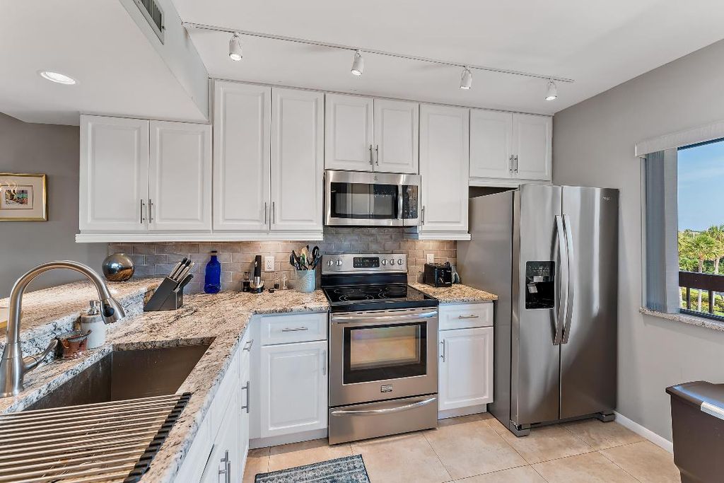 Photo of 301 Ocean Bluffs Boulevard #405, Jupiter, FL 33477 (MLS # R10959968)