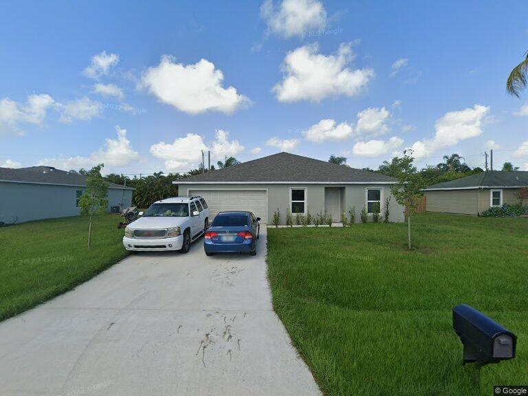 Photo of 1085 SW Firestone Avenue, Port Saint Lucie, FL 34953 (MLS # B26038631)