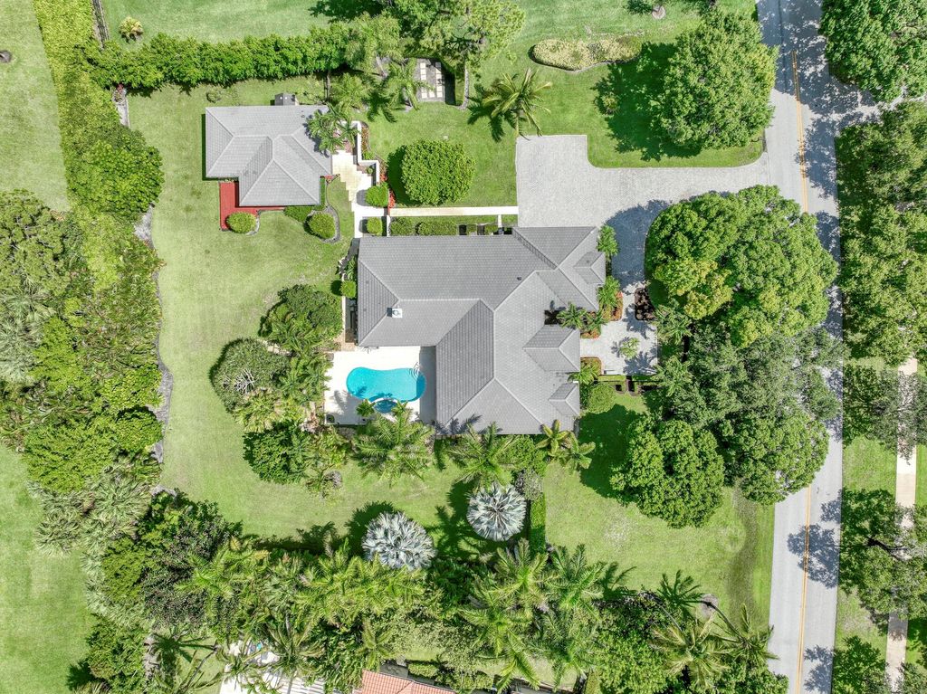 Photo of 7675 Steeplechase Drive, Palm Beach Gardens, FL 33418 (MLS # R11002405)