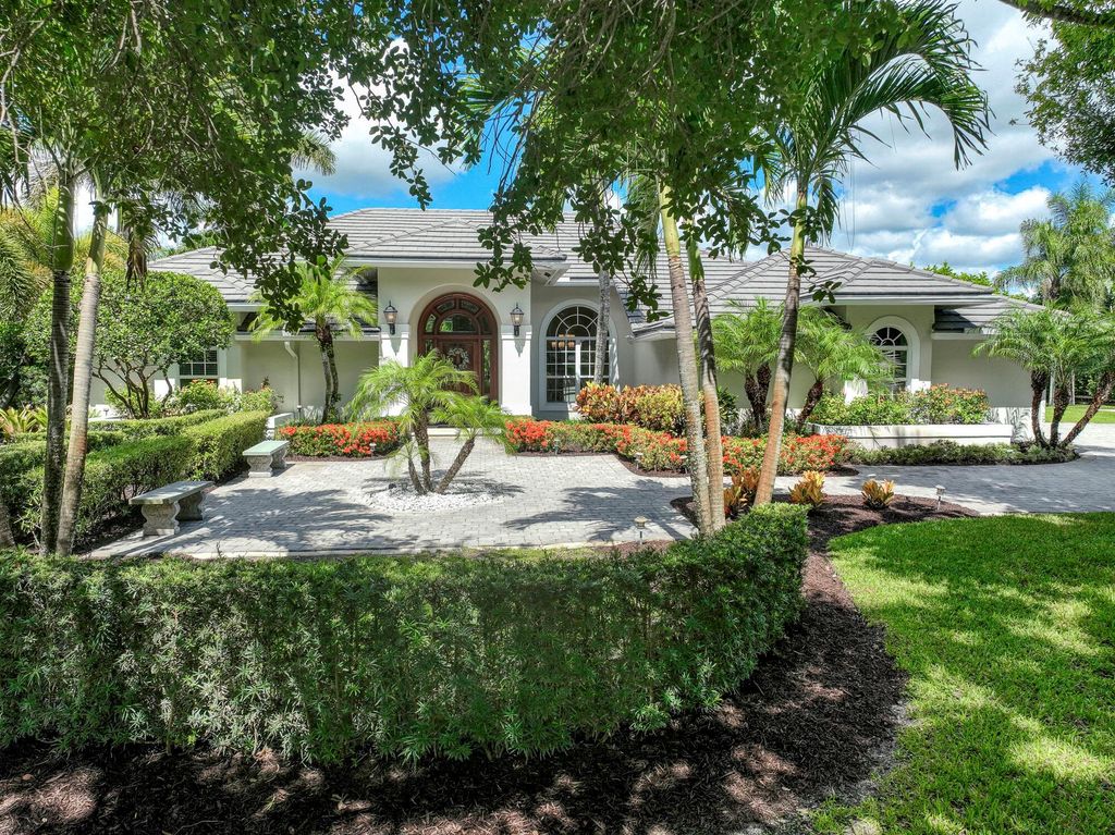 Photo of 7675 Steeplechase Drive, Palm Beach Gardens, FL 33418 (MLS # R11002405)