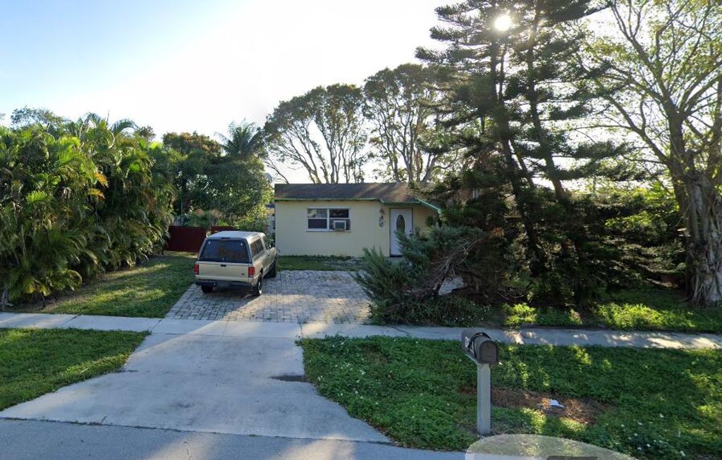 Photo of 9148 Bamboo Drive, Palm Beach Gardens, FL 33410 (MLS # R10976368)