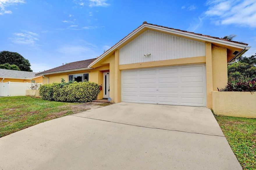 A rare opportunity close to FAU to make a 4-bedroom home your own! Priced to sell, this fixer-upper already has many upgrades such as full impact windows, 2024 hot water heater, 2019 A/C, & Siemens electrical panel. Located in the quiet and established neighborhood of Pinelands North. Perfect and popular 4-bedroom, 2-bath layout that can be customized as an open floor plan. Covered patio with plenty of room in the spacious yard for a pool. Minutes to I-95, FAU, the best of Boca's shopping, beaches, parks and restaurants. Make this home your own! Great opportunity!