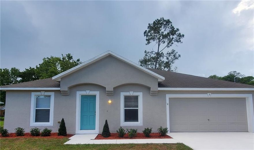 This wonderful 3 BR home is waiting for a new owner! Just newly upgraded, it's been freshly painted INSIDE and OUT and beautiful new flooring has been installed throughout. The kitchen feature all new stainless steel Whirlpool appliances-dishwasher, refrigerator with icemaker, microwave and smooth top stove. The Living Room/Dining Room has a tall vaulted ceiling and has sliders that open to the large back yard and newly painted patio. Fresh new plantings welcome you at the front door. Situated on a nice cul-de-sac, the home is conveniently located to I-95 and US1. It's just minutes from the shops, restaurants, banks and movie theatres of the Town Center. Advent Health hospital and medical offices are a short drive away and it's less than 15 minutes to our beautiful beaches.