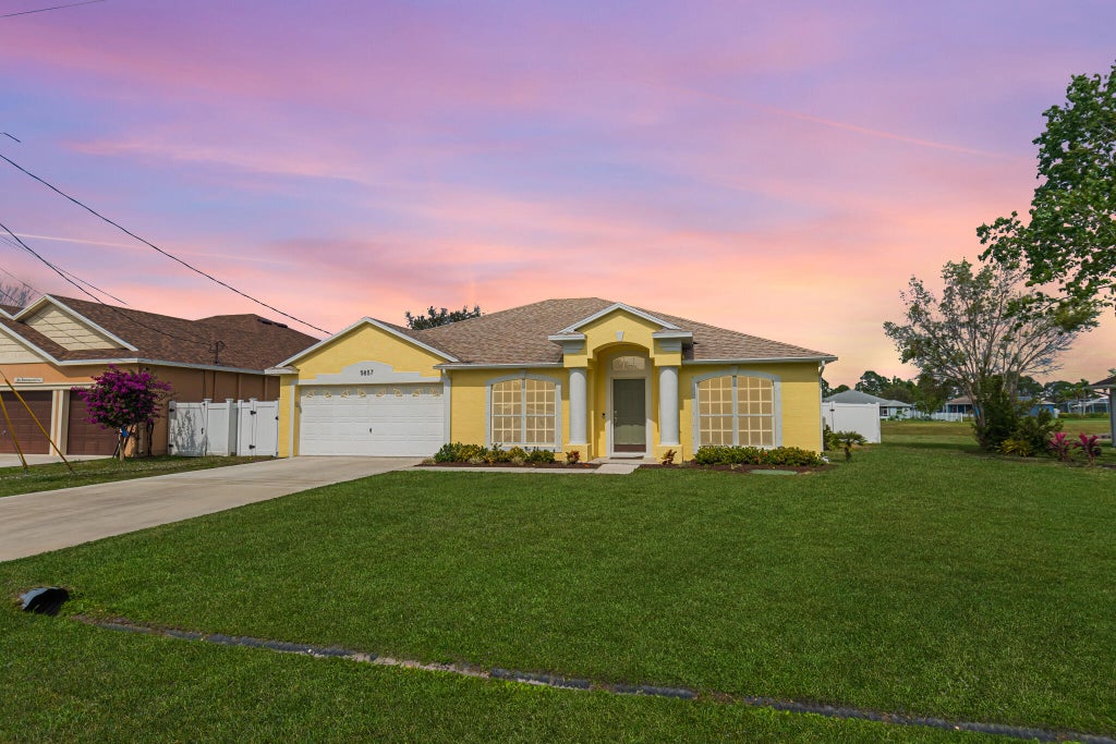 Photo of 5857 NW Corso Avenue, Port Saint Lucie, FL 34986 (MLS # R11064335)