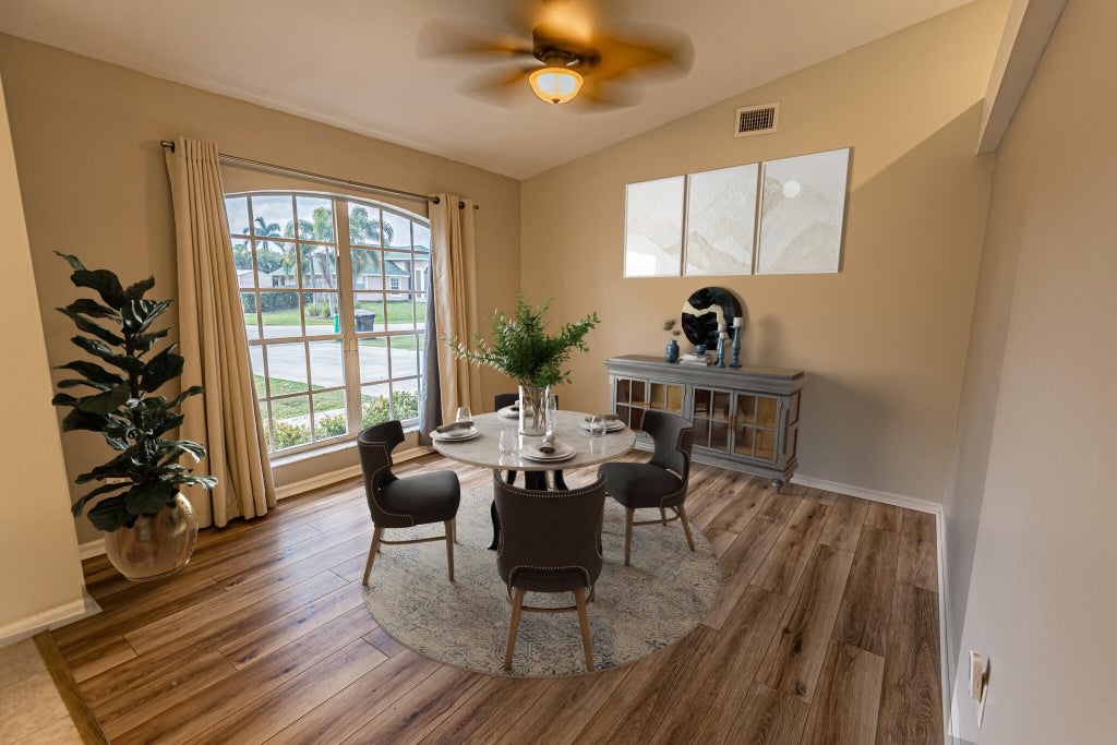 Photo of 5857 NW Corso Avenue, Port Saint Lucie, FL 34986 (MLS # R11064335)