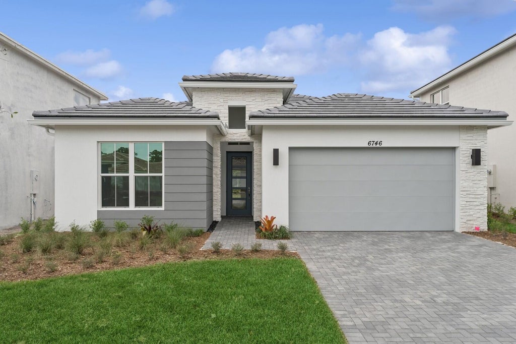 Photo of 6746 SE Lost Pne Drive #18, Stuart, FL 34997 (MLS # R11031405)
