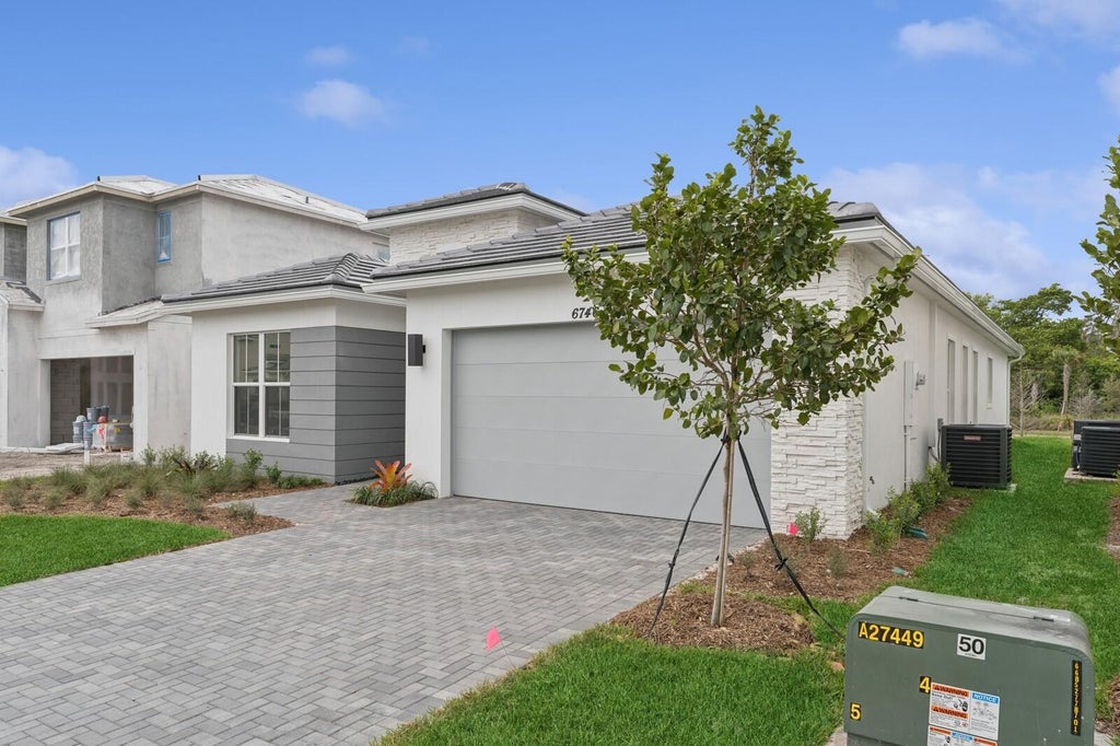 Photo of 6746 SE Lost Pne Drive #18, Stuart, FL 34997 (MLS # R11031405)