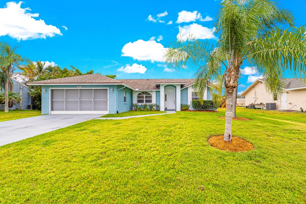Photo of 2479 SE Marseille Street, Port Saint Lucie, FL 34952 (MLS # R10797143)