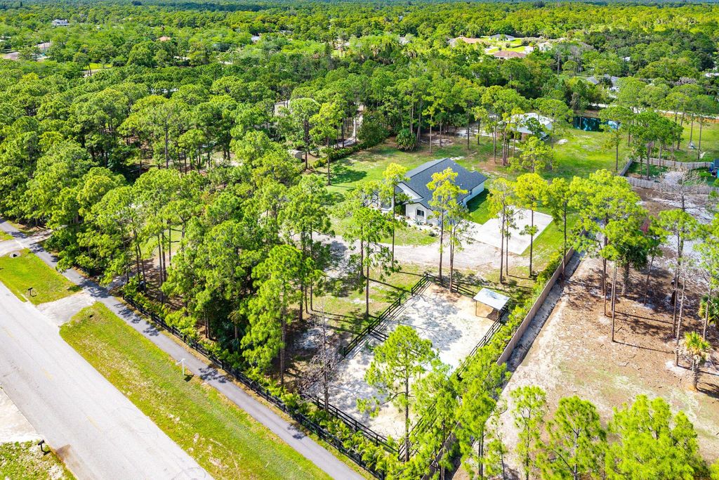 Photo of 16105 Temple Boulevard, The Acreage, FL 33470 (MLS # B26010139)