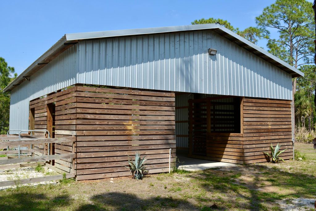Photo of 16105 Temple Boulevard, The Acreage, FL 33470 (MLS # B26010139)