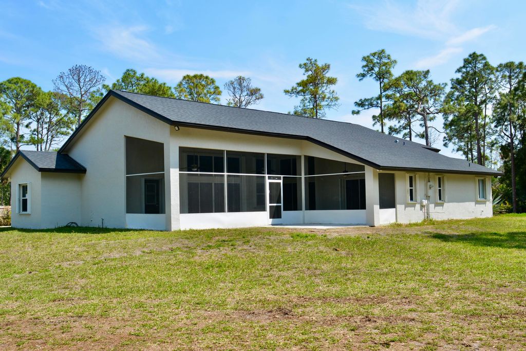 Photo of 16105 Temple Boulevard, The Acreage, FL 33470 (MLS # B26010139)
