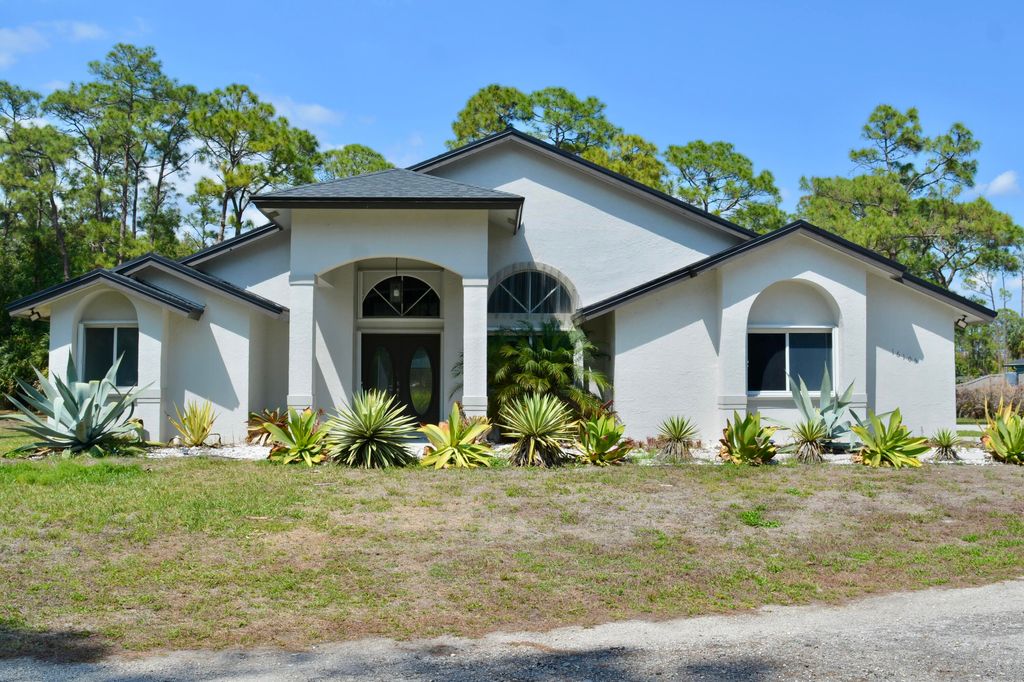 Photo of 16105 Temple Boulevard, The Acreage, FL 33470 (MLS # B26010139)