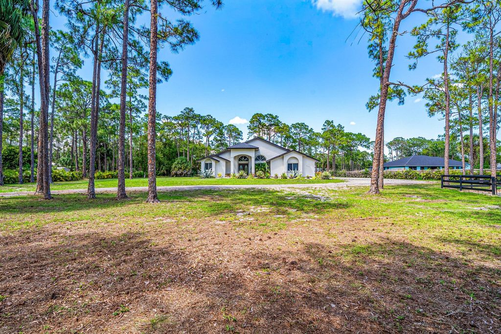 Photo of 16105 Temple Boulevard, The Acreage, FL 33470 (MLS # B26010139)