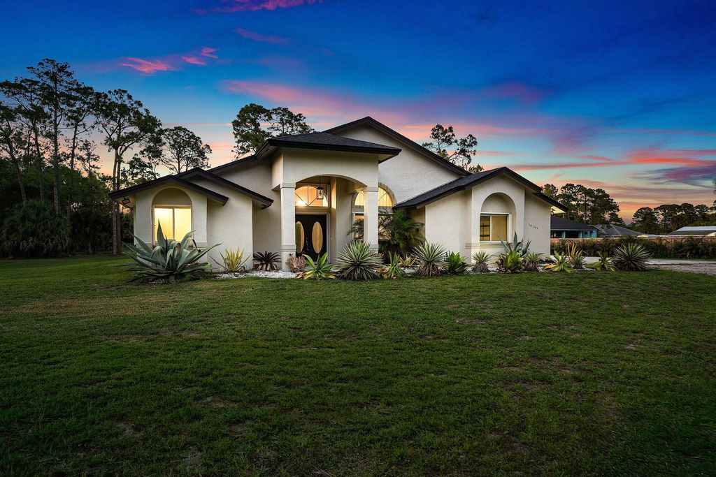 Photo of 16105 Temple Boulevard, The Acreage, FL 33470 (MLS # B26010139)