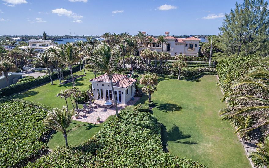 Fantastic Custom Mediterranean Ocean to Intracoastal Estate Situated on nearly two acres, sweeping from 150 feet of Atlantic beachfront to 150 feet on the Intra-Coastal, this spectacular European-inspired estate commands breathtaking views at every turn. Features include private yacht dockage, theater room, wine cellar, fitness center, resort style pool, separate oceanfront cottage along with grand entertaining loggia alongside the pool. Property couldn't be replicated for anywhere near this price today.