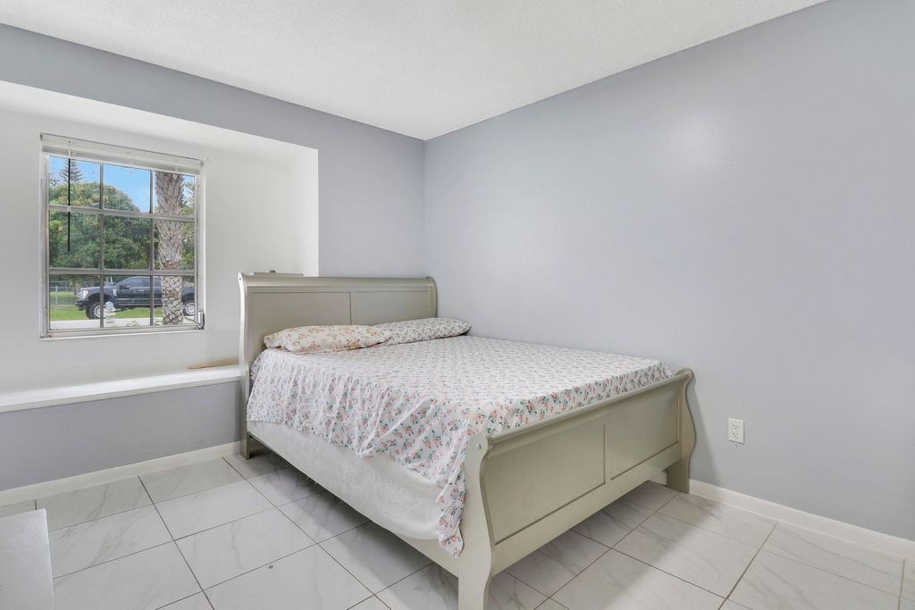 Photo of 711 SE Floresta Drive, Port Saint Lucie, FL 34983 (MLS # R10950558)