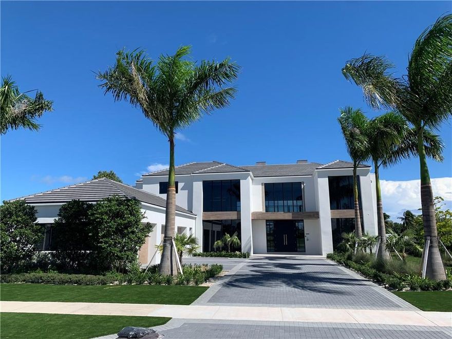 Golf course living at it’s finest in this 5 BR | 6.5 Bath | 3.5 Car | 2 Laundry | Office | two story modern custom residence located in the guard gated golf course community of The Enclave at the Coral Ridge Country Club. Two stories of floor to ceiling windows greet you as you enter the foyer, living and dining rooms showcasing the renowned Robert Trent Jones, Sr. 18- hole championship golf course. Floor to ceiling windows and sliders are found throughout, including the kitchen finished with custom cabinetry, large island, walk-in pantry and Thermador/ Sub-Zero appliances. Access the 2nd flood by the elevator or floating staircase with glass and metal railing. Large master bedroom with sitting area and stunning master bathroom, all with east and southeast gold course views.