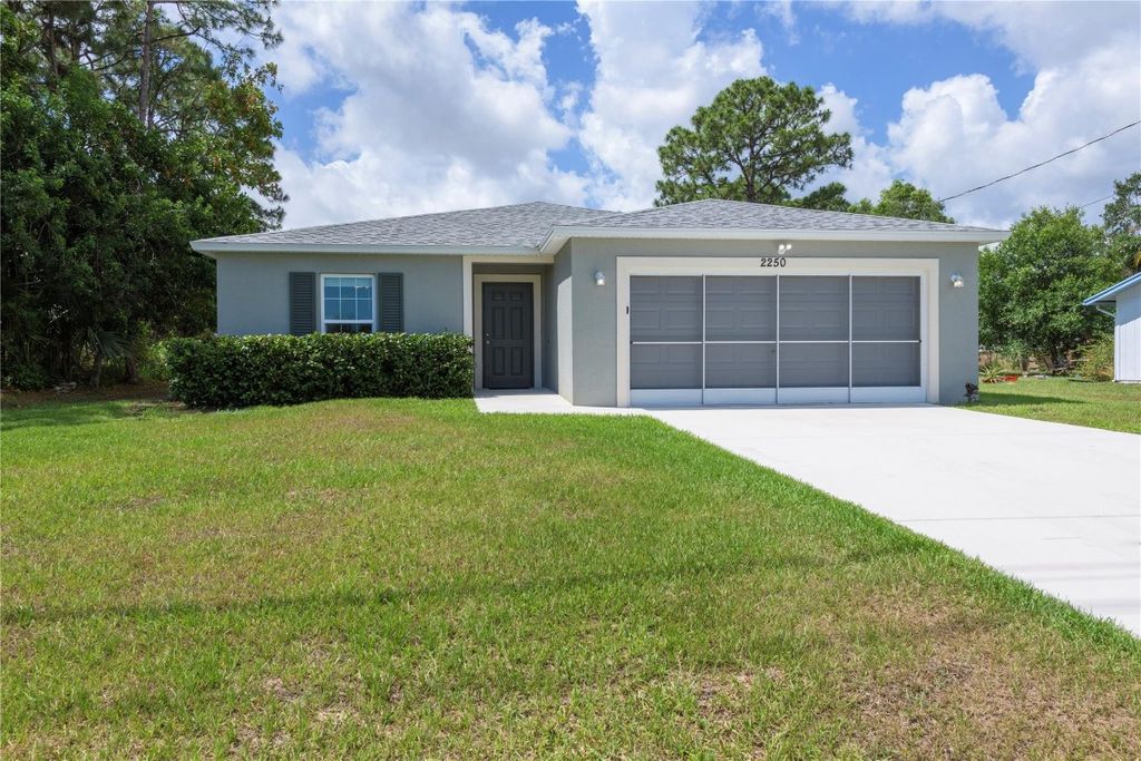 Photo of 2250 SE Tiffany Avenue, Port Saint Lucie, FL 34952 (MLS # F10442293)