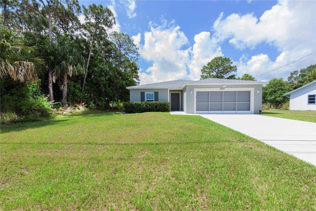 Photo of 2250 SE Tiffany Avenue, Port Saint Lucie, FL 34952 (MLS # F10442293)