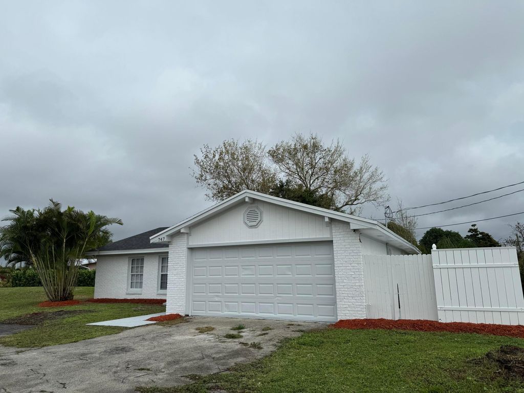 Photo of 747 E Prima Vista Boulevard, Port Saint Lucie, FL 34952 (MLS # B26010891)