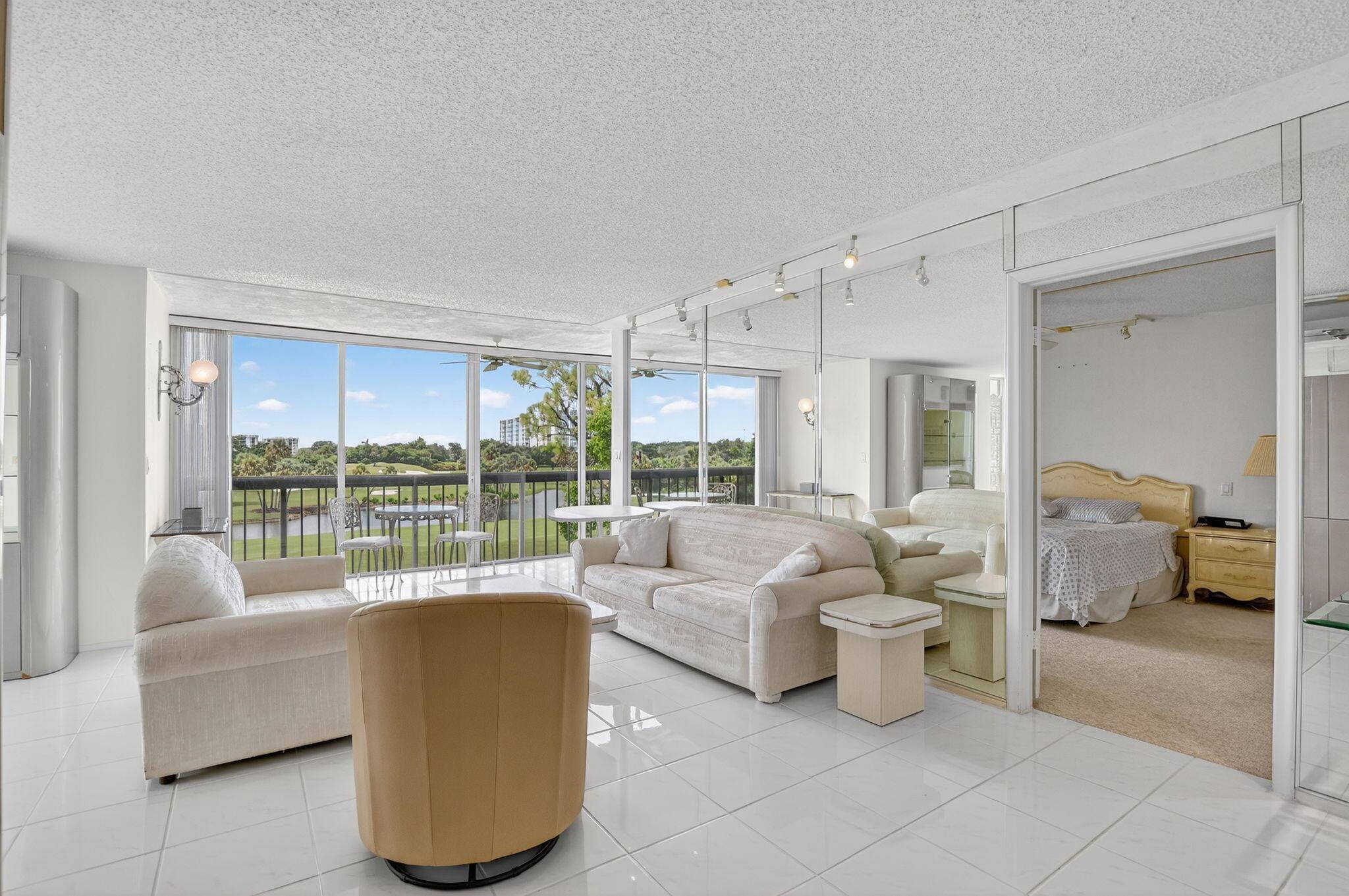 This 2 bed 2 Bath Bridgewood Corner unit has postcard views and open concept living with both patios bumped out. Great opportunity to make this unit your own. Within walking distance to the pool, fitness center, & spa. Electric upgrades include brand new appliances, A/C, water heater, washer & dryer. Designer finishes throughout include porcelain tile floors & quartz countertops. ~ Imagine life inside the Nation's #1 Private Residential Country Club Lifestyle offering resort-style living. PLAY our 4 Golf courses, 27 Tennis courts and 14 Pickleball courts; SHOP our retail store, golf and tennis pro shops, DINE in our 10 dining venues. 5-star fitness center, pool, spa and salon. ENJOY endless activities in over 450,000 sq. ft. of exceptional amenities & stellar service.