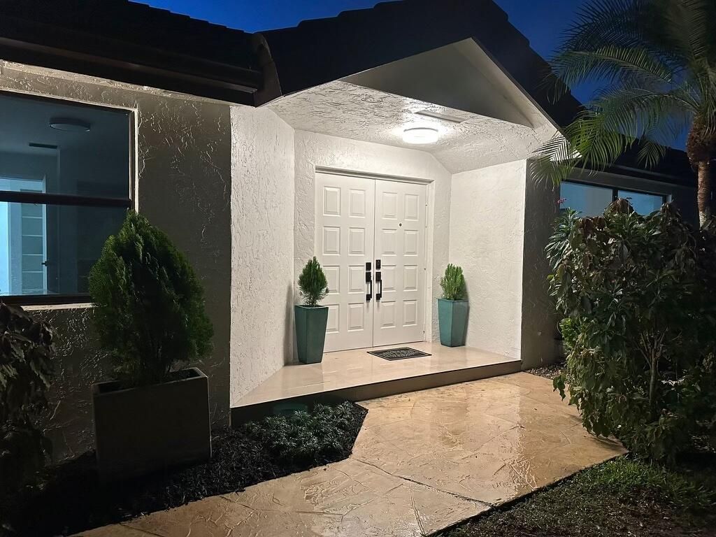 Photo of 11294 Clover Leaf Circle, Boca Raton, FL 33428 (MLS # R10946368)