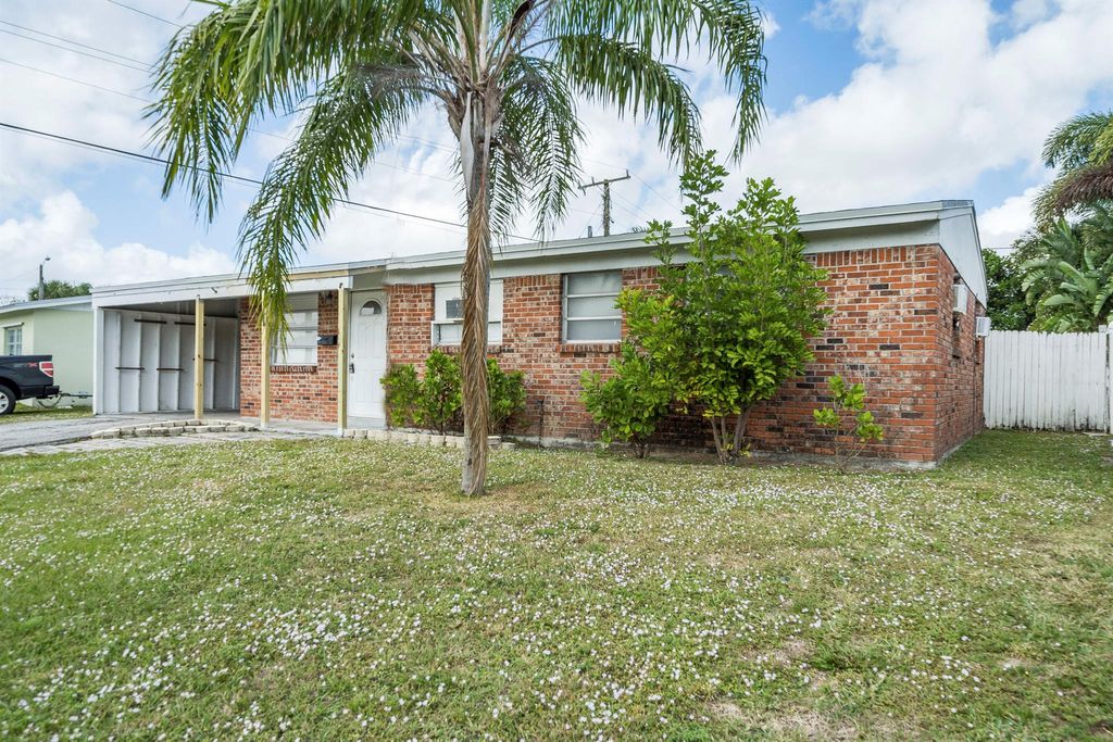 Photo of 3865 Florida Boulevard, Palm Beach Gardens, FL 33410 (MLS # R10926864)