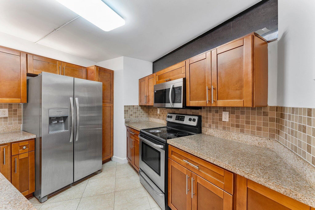 Photo of 8195 SEVERN Drive #A, Boca Raton, FL 33433 (MLS # B26068972)