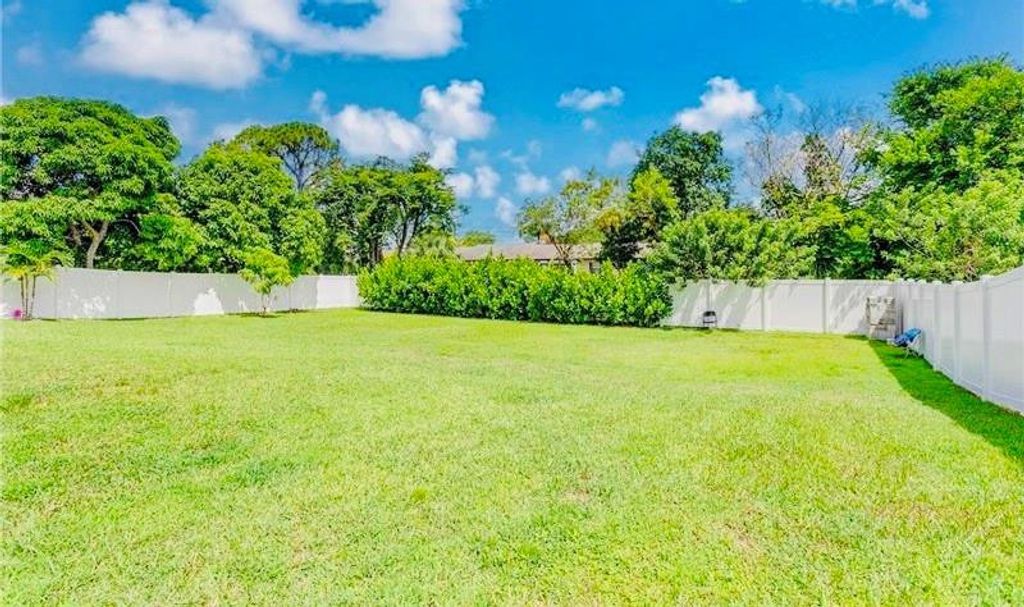 Photo of 128 N Royal Pine Circle, Royal Palm Beach, FL 33411 (MLS # F10539778)