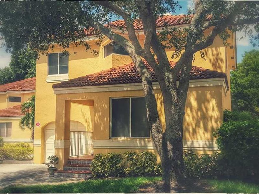 Spectacular Portofino!!- Free standing townhome - like a single family home- Neutrally done & a pleasure to show - Light & Bright with a backyard paradise-tiled screened in porch & open paver patio- corner. 1 car garage- lots of guest parking. Newer wood  like flooring in the downstairs room- Updated half bathroom downstairs- Under a condo association. Maintenance includes lawn, pool, insurance,roof replacement ..etc.Great community with great schools- Close to shopping, major highways &  houses of worship