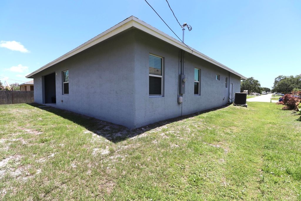 Photo of 134 NW Heather Street, Port Saint Lucie, FL 34983 (MLS # B26033350)