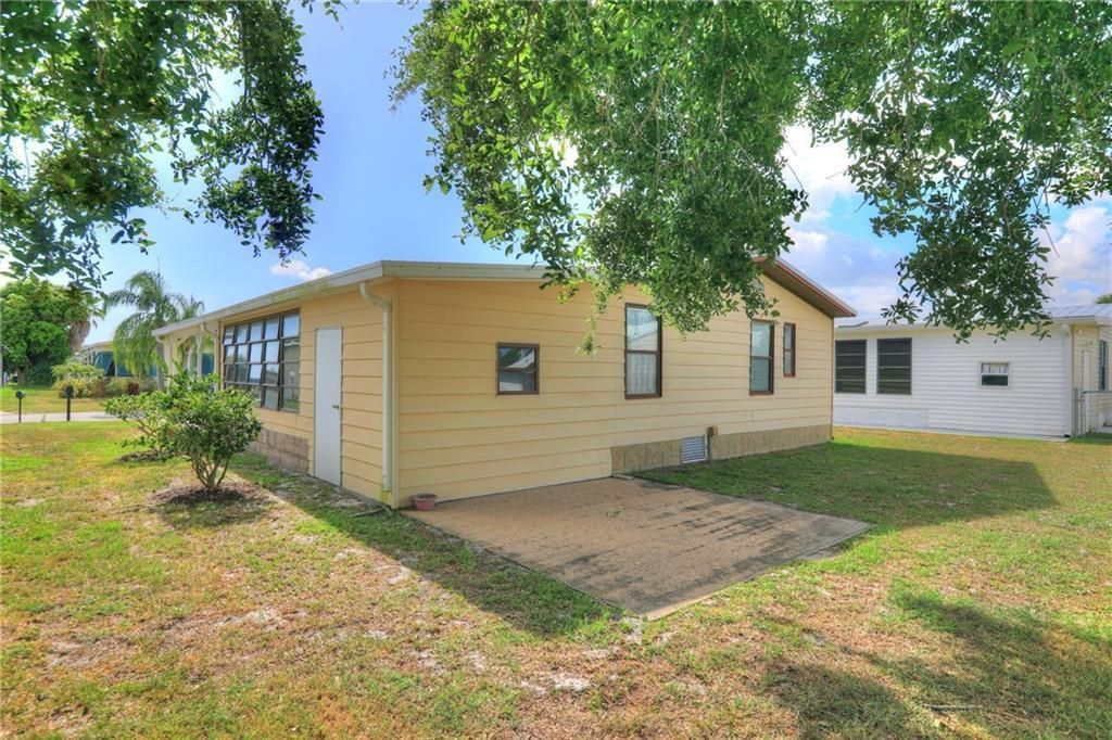 Photo of 705 Hyacinth Circle, Barefoot Bay, FL 32976 (MLS # R11148856)