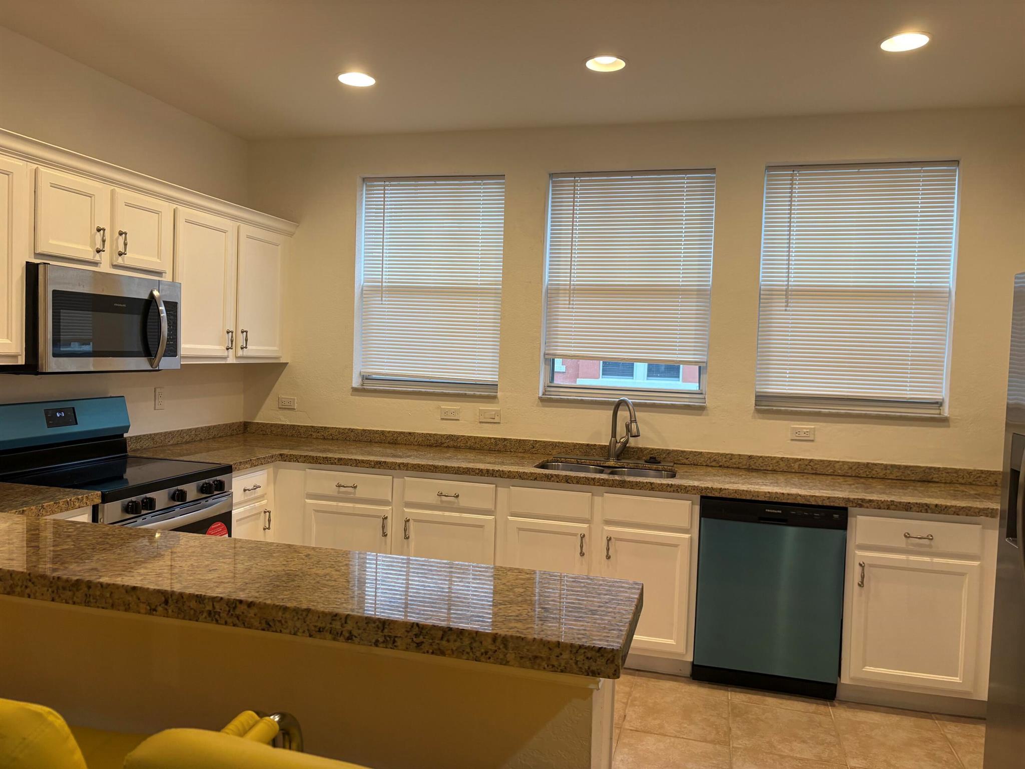 Fully FURNISHED, new APPLIANCES - new AC UNIT. 2-bedroom 2 bath townhome with 1 car garage, built over 3 levels. Gated community centrally located in just minutes from downtown West Palm Beach, City Place, Palm Beach International Airport. Walking distance to Palm Beach Outlet Mall, and much more. This gated community offers all the amenities one could ask for. The HOA DUES include Water, Trash, Basic Cables, Internet & Insurance.