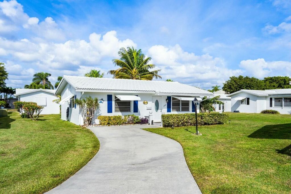 Photo of 2089 SW Lake Circle Drive, Boynton Beach, FL 33426 (MLS # R11045031)