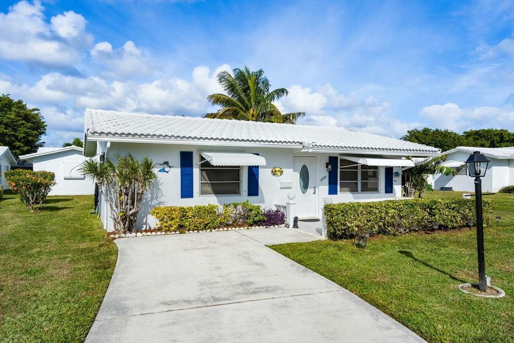 Photo of 2089 SW Lake Circle Drive, Boynton Beach, FL 33426 (MLS # R11045031)